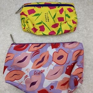 Set of two CLINIQUE makeup cases. Bold and fun.